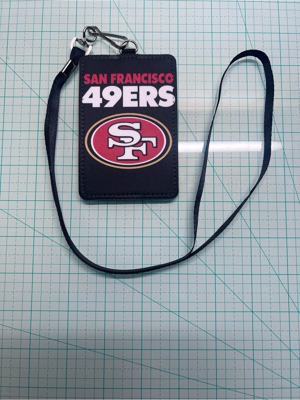 San Francisco 49ers ID badge holder with a matching black lanyard
